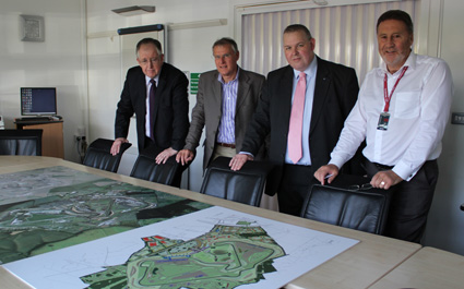 Lord McNAlly, Martin Johns, Scott Collins and Richard Philips looking over the future plans for Silverstone